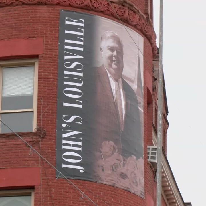 'Hometown Hero' banner dedicated to longtime Churchill Downs spokesperson
